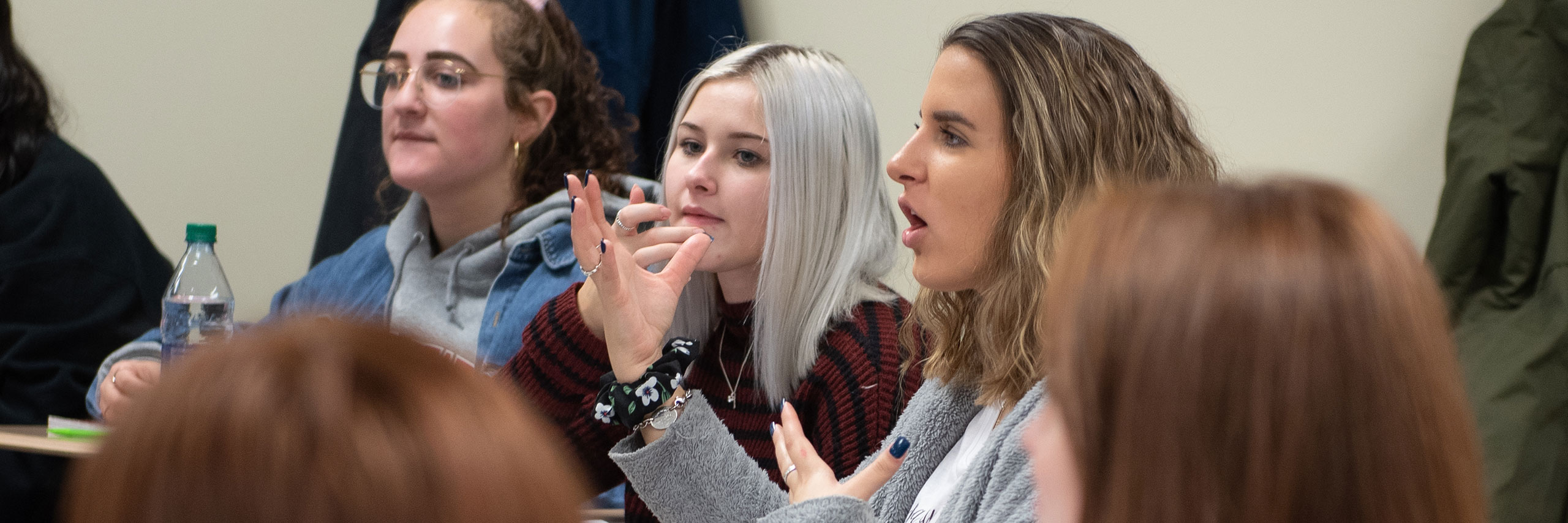 Students in a classroom talking